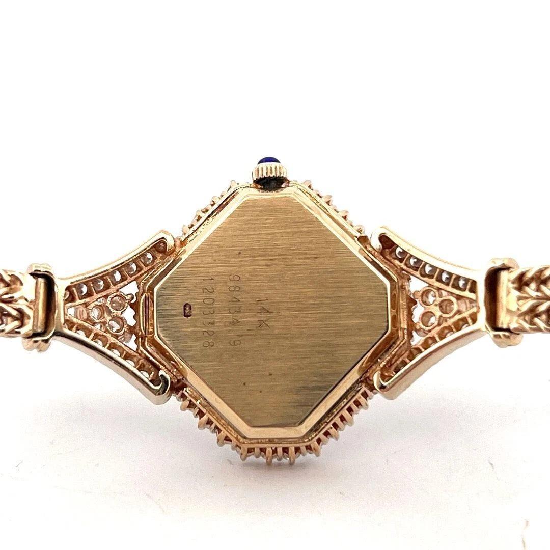 Rare Vintage Baume & Mercier Ladies 14K Yellow Gold 1.50CTW Diamond Quartz Watch - Devine & Co.