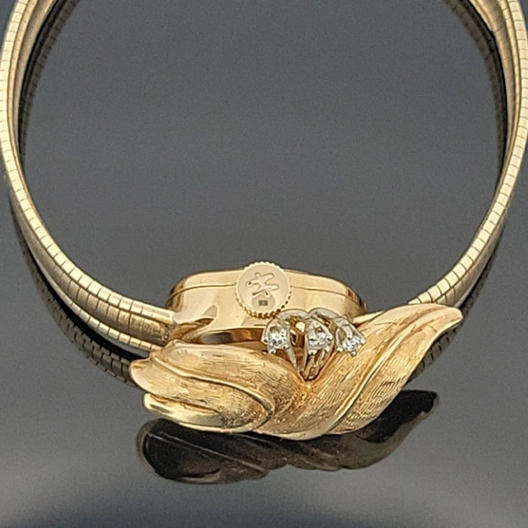 Vintage Hamilton 14K Yellow Gold Hidden Watch Bracelet Florentine Leaf Diamonds by Devine & Co — angled view