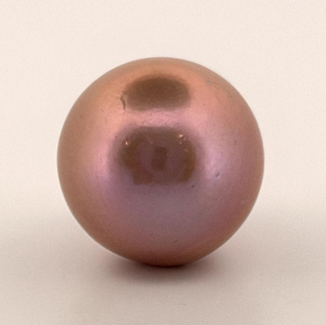 Certified 18.7mm Loose Intense Lilac Freshwater Cultured Pearl Undrilled Superior, angled view
