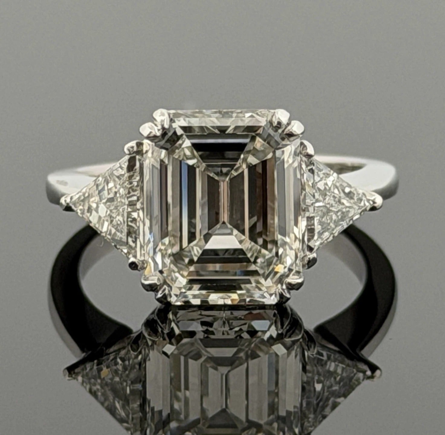 Consignment - Platinum Three-Stone Ring 4.10ct Emerald Cut Diamond GIA Certified Trillion Sides Size 6.5 - platinum, diamo...