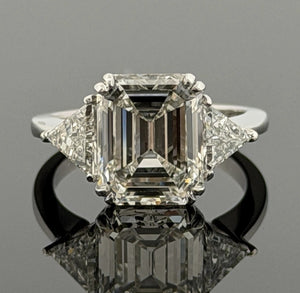 Platinum Three-Stone Ring 4.10ct Emerald Cut Diamond GIA Certified Trillion Sides Size 6.5
