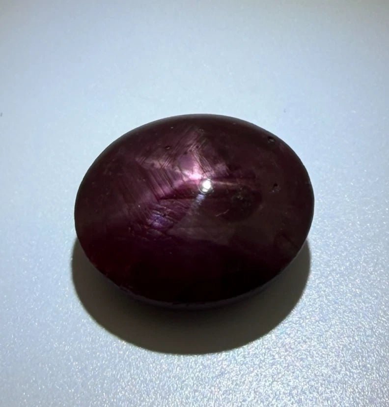 Natural Star Ruby 13.61 Carats Oval Cabochon 6 Ray Star Loose Gemstone - Devine & Co.