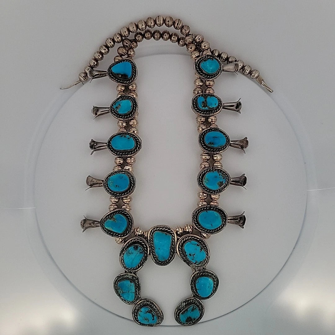 Vintage Sterling Silver Squash Blossom Necklace with Turquoise, 170 Grams, 24" by Devine & Co — profile view