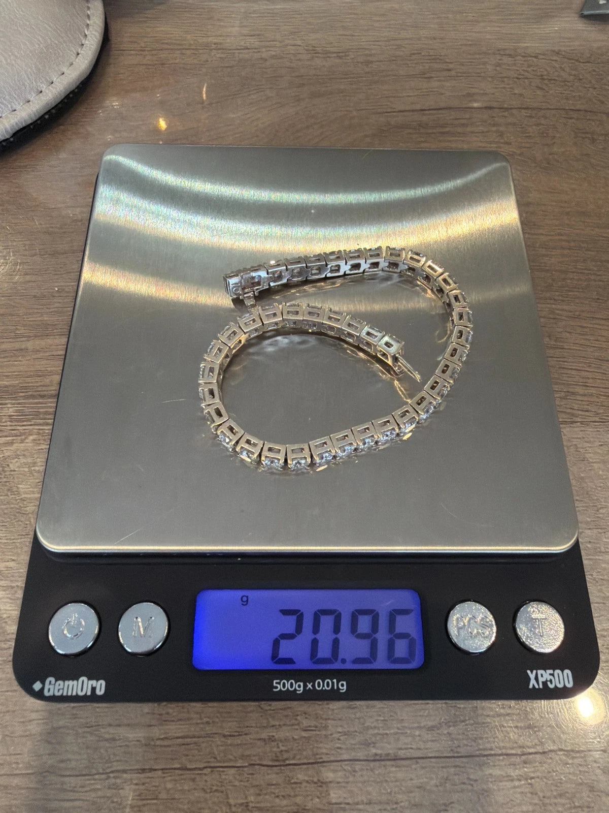 14K White Gold Natural Round Diamond Tennis Bracelet 9.80 ctw 7" G-H VS-SI by Devine & Co — angled view