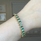 14K Yellow Gold Emerald & Diamond Bangle Bracelet, Marquise Emeralds, 7.5 Oval by Devine & Co — back view