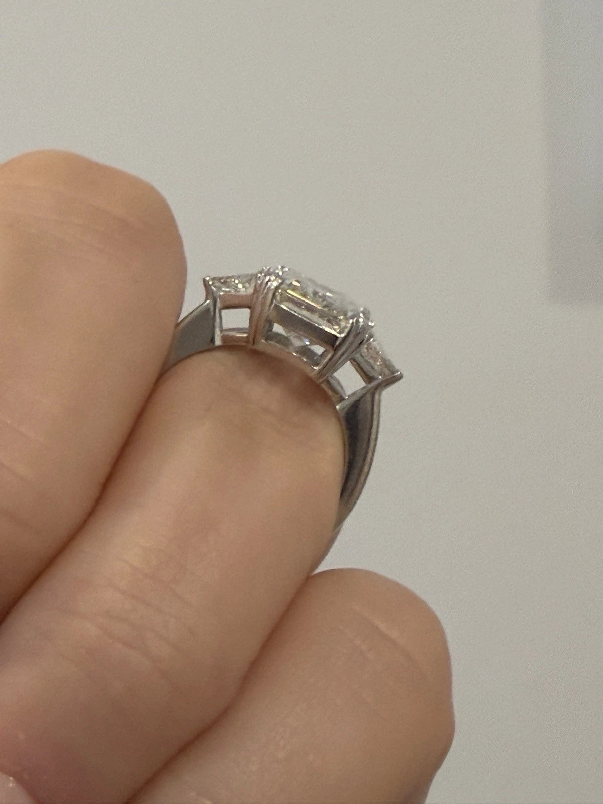 Platinum Three-Stone Ring 4.10ct Emerald Cut Natural Diamond GIA with Trillions by Devine & Co — back view
