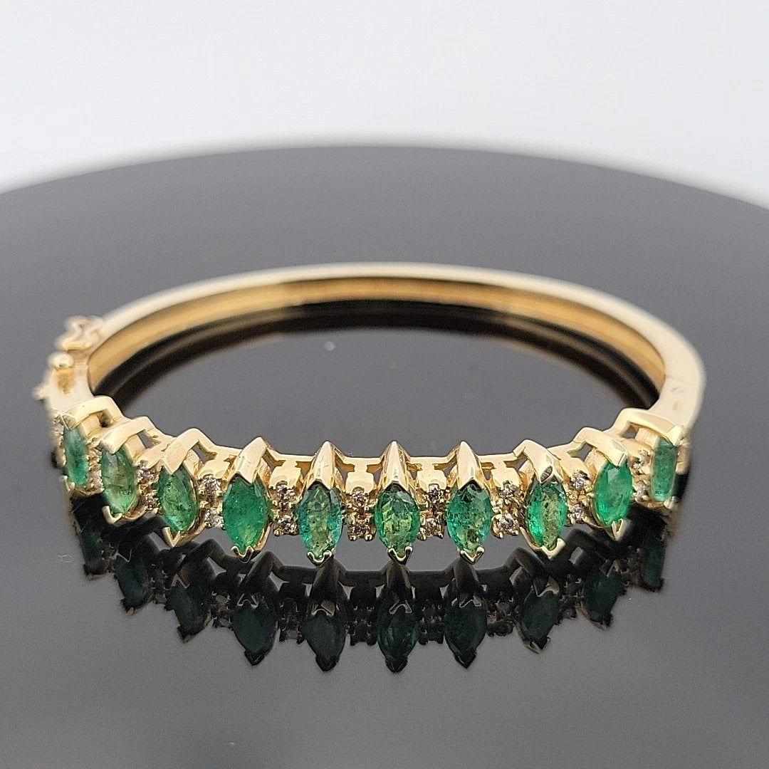 14K Yellow Gold Emerald & Diamond Bangle Bracelet, Marquise Emeralds, 7.5 Oval by Devine & Co — front view