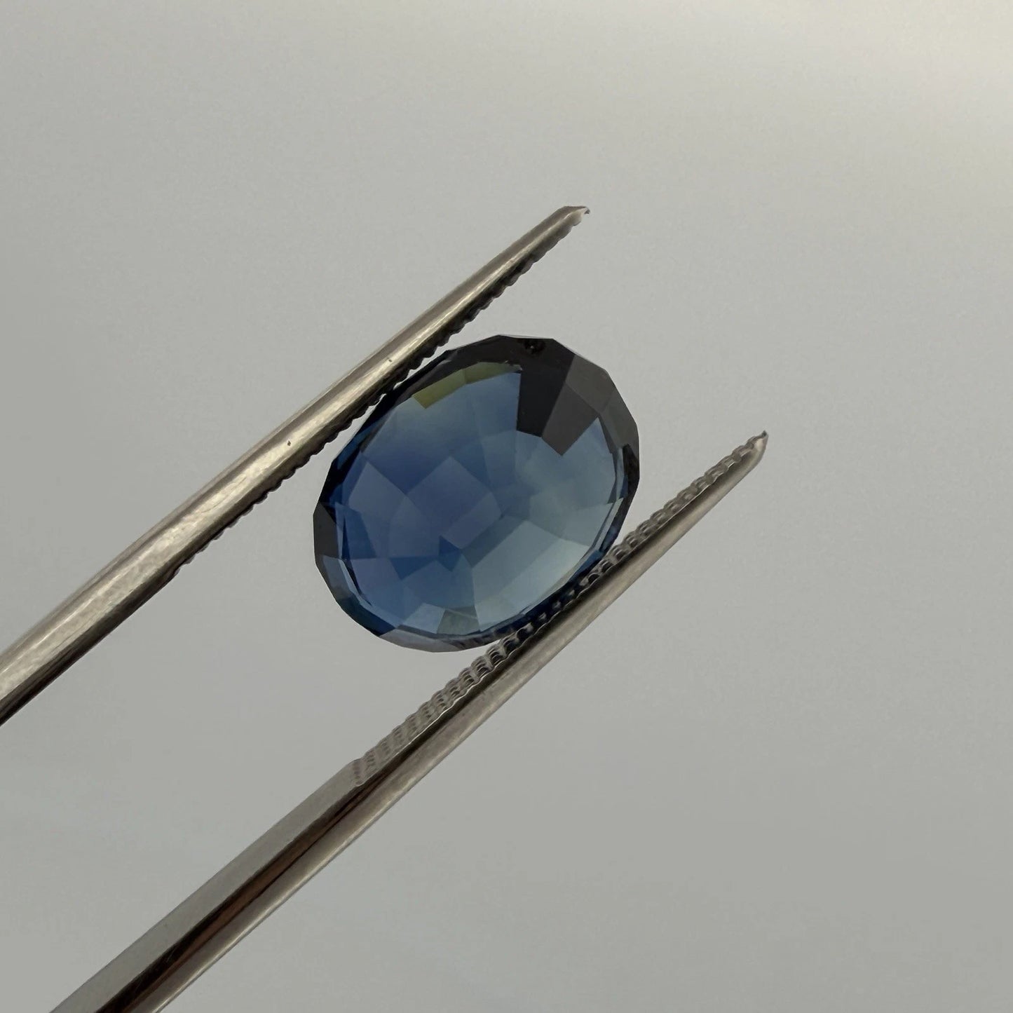 Natural Heated Thailand Loose Blue Sapphire GIA 6.37ct Oval Faceted, close-up detail