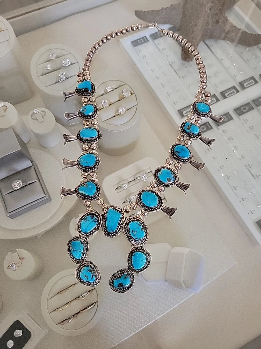 Vintage Sterling Silver Squash Blossom Necklace with Turquoise, 170 Grams, 24" by Devine & Co — angled view