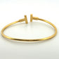 Tiffany & Co. T Wire Bracelet 18K Yellow Gold Mother of Pearl Diamond Bracelet by Devine & Co — angled view