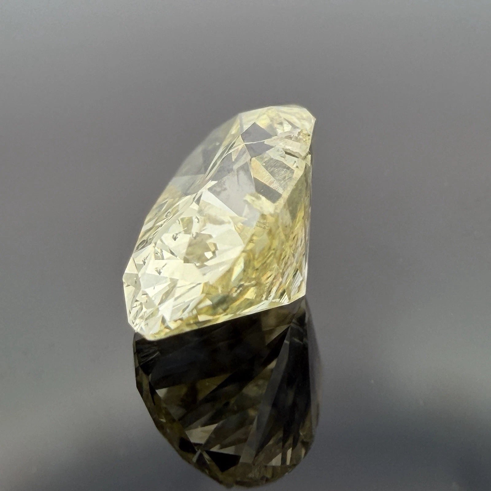 Natural Fancy Yellow Diamond GIA 2.12ct Oval Brilliant I2 Loose Diamond, close-up detail