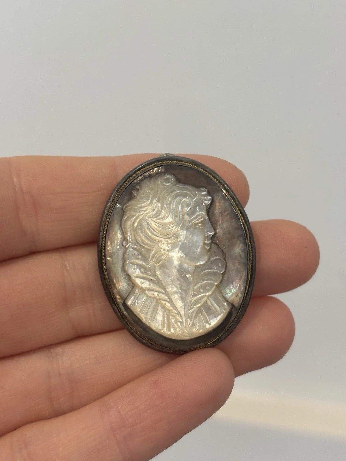 Vintage 800 Silver Mother of Pearl Cameo Pendant Brooch 38x30mm 9.23g by Devine & Co — angled view