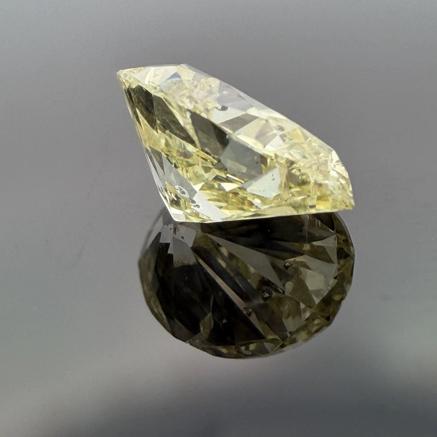 Natural Fancy Yellow Diamond GIA 2.12ct Oval Brilliant I2 Loose Diamond, detail view
