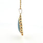 Large Triangular Black Opal Doublet Pendant with Round Crystal Opals 18 13g 14K by Devine & Co — angled view