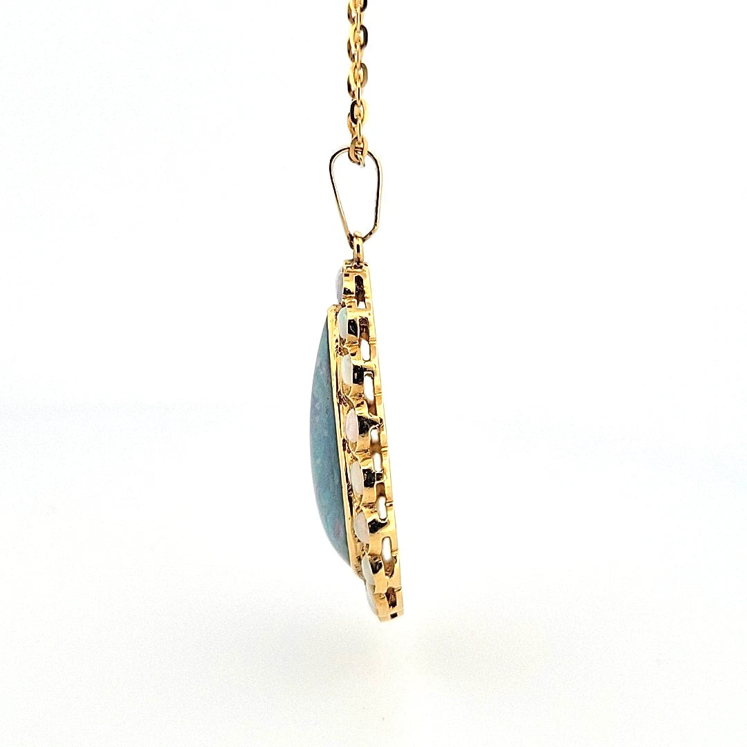 Large Triangular Black Opal Doublet Pendant with Round Crystal Opals 18 13g 14K by Devine & Co — angled view