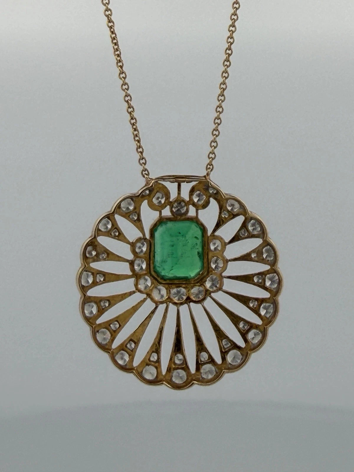 Natural Colombian Emerald and Diamond Pendant Necklace 18K Yellow Gold GIA Report, angled view