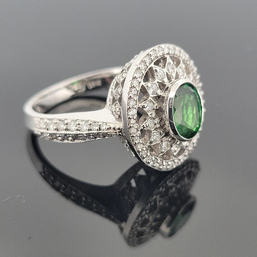 18K White Gold Tsavorite & Diamond Ring 1.51ct Oval Tsavorite 1.02ctw Diamonds by Devine & Co — angled view