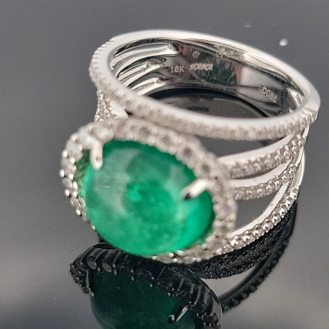 18K White Gold Oval Cabochon Emerald Ring 4.63ct Diamond Split Pave Shank 0.85ct by Devine & Co — angled view