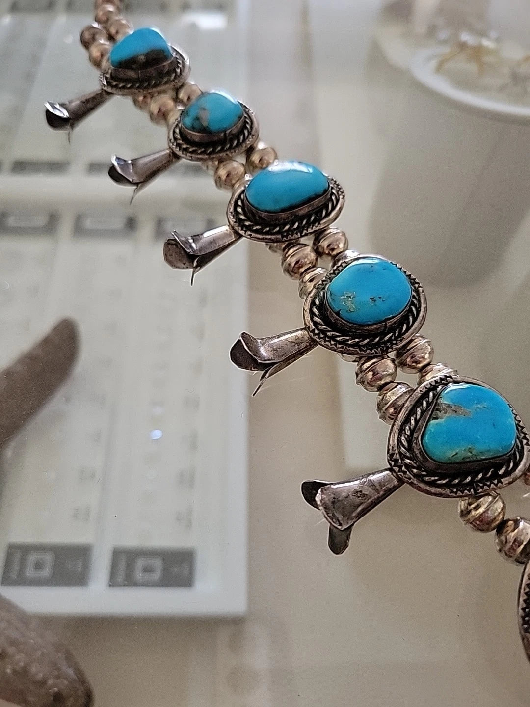 Vintage Sterling Silver Squash Blossom Necklace with Turquoise, 170 Grams, 24" by Devine & Co — angled view