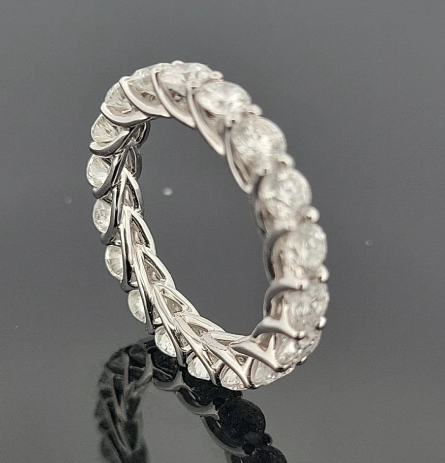 18K White Gold Diamond Eternity Trellis Band Round Brilliant 3.39ctw G-H-I SI by Devine & Co — angled view