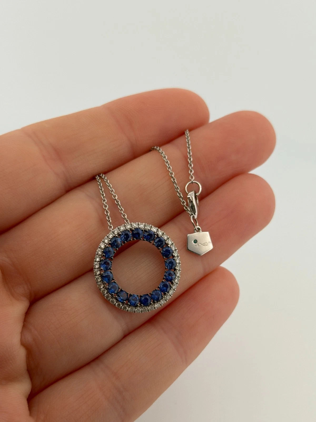 Graziela 18K White Gold Blue Round Sapphire & Diamond Circle Necklace 16" by Devine & Co — side view