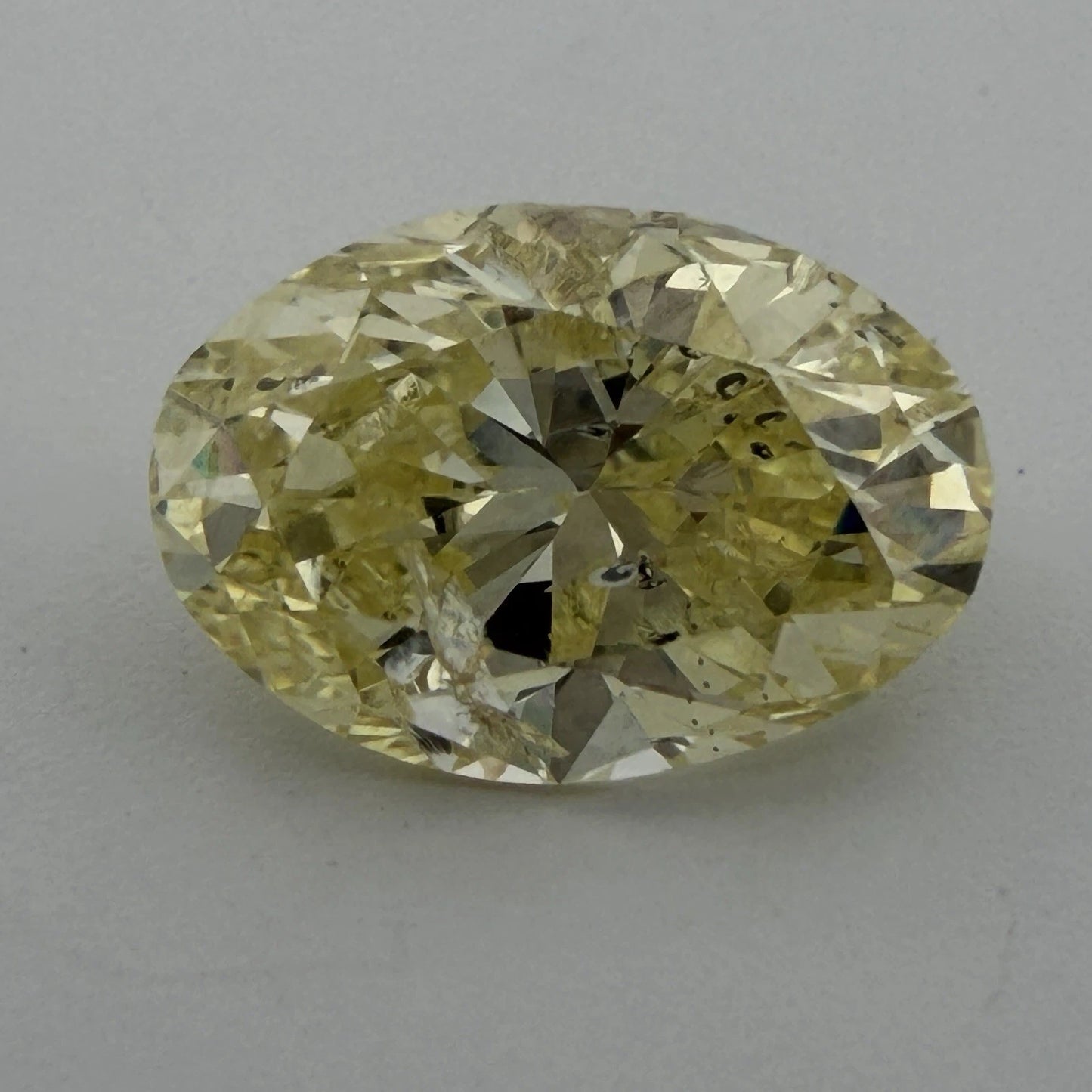 Natural Fancy Yellow Diamond GIA 2.12ct Oval Brilliant I2 Loose Diamond, facet detail