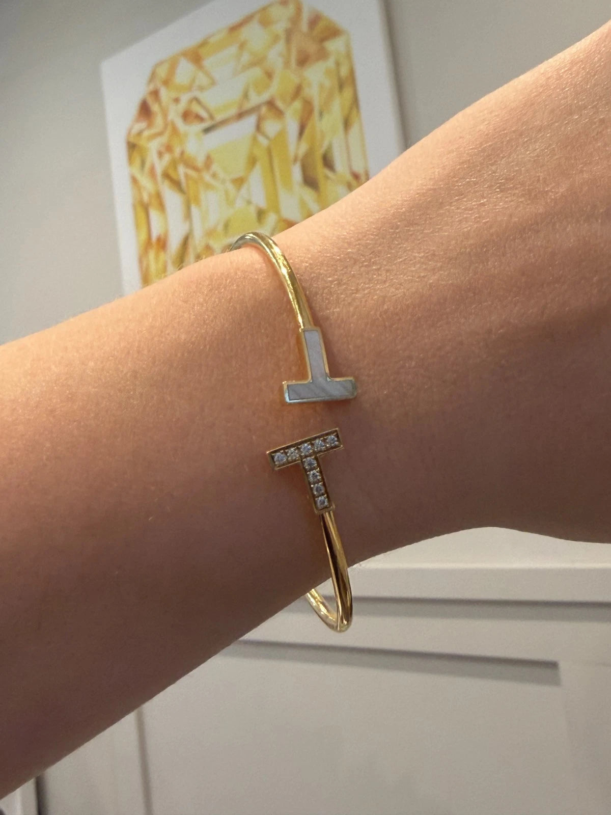 Tiffany & Co. T Wire Bracelet 18K Yellow Gold Mother of Pearl Diamond Bracelet by Devine & Co — detail view