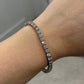 14K White Gold Natural Round Diamond Tennis Bracelet 9.80 ctw 7" G-H VS-SI by Devine & Co — angled view