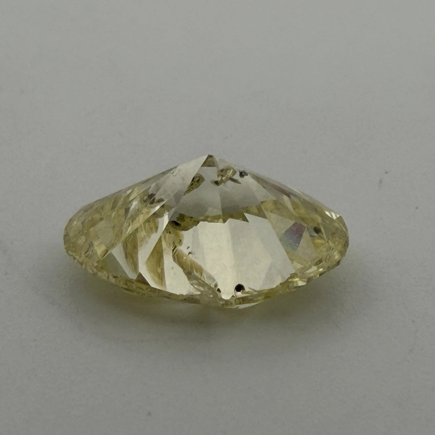 Natural Fancy Yellow Diamond GIA 2.12ct Oval Brilliant I2 Loose Diamond, angled view