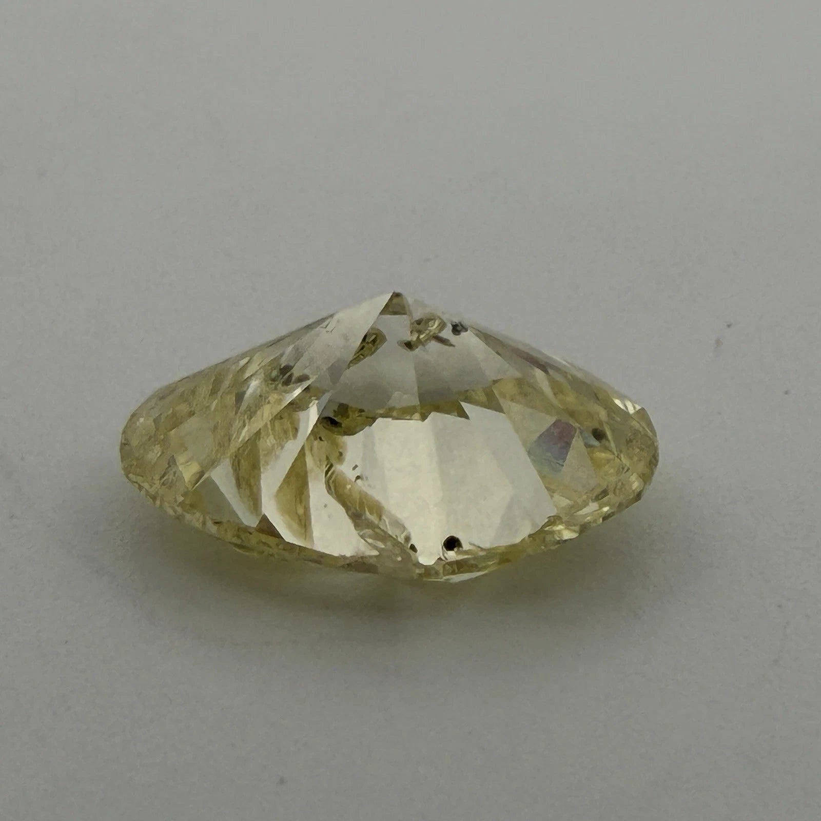 Natural Fancy Yellow Diamond GIA 2.12ct Oval Brilliant I2 Loose Diamond, angled view