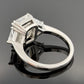 Platinum Three-Stone Ring 4.10ct Emerald Cut Natural Diamond GIA with Trillions by Devine & Co — detail view