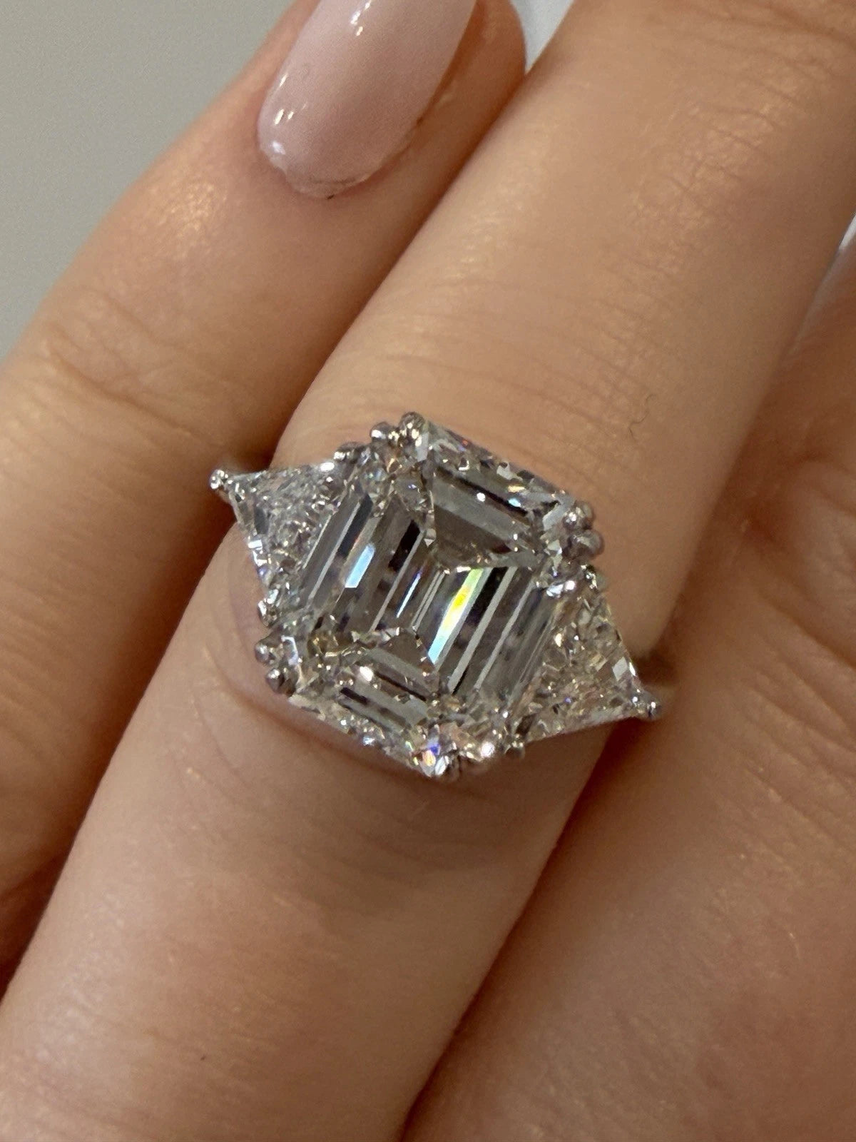 Platinum Three-Stone Ring 4.10ct Emerald Cut Natural Diamond GIA with Trillions by Devine & Co — close-up