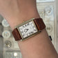 Cyma Swiss Quartz Tank Style Watch 14K Yellow Gold Case Vintage 1990's, caseback detail