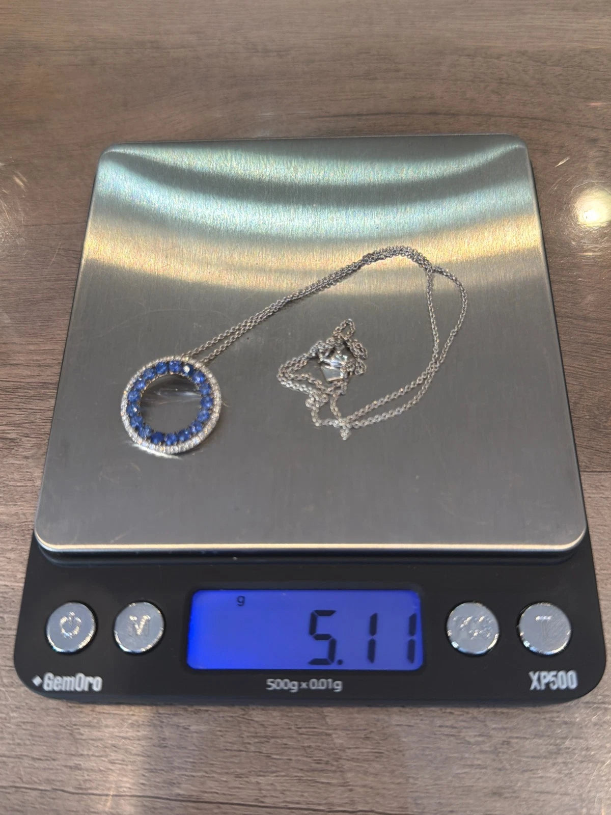 Graziela 18K White Gold Blue Round Sapphire & Diamond Circle Necklace 16" by Devine & Co — close-up