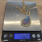 Large Triangular Black Opal Doublet Pendant with Round Crystal Opals 18 13g 14K by Devine & Co — close-up