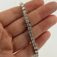 14K White Gold Natural Round Diamond Tennis Bracelet 9.80 ctw 7" G-H VS-SI by Devine & Co — side view