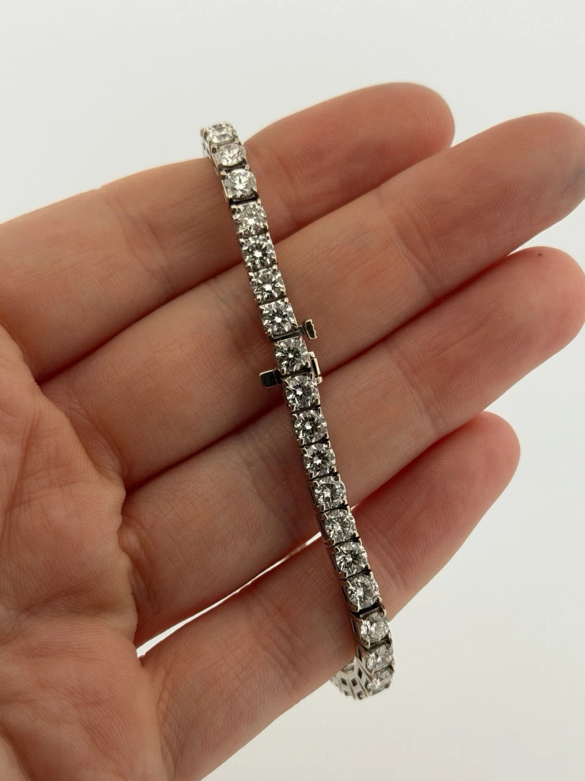 14K White Gold Natural Round Diamond Tennis Bracelet 9.80 ctw 7" G-H VS-SI by Devine & Co — side view