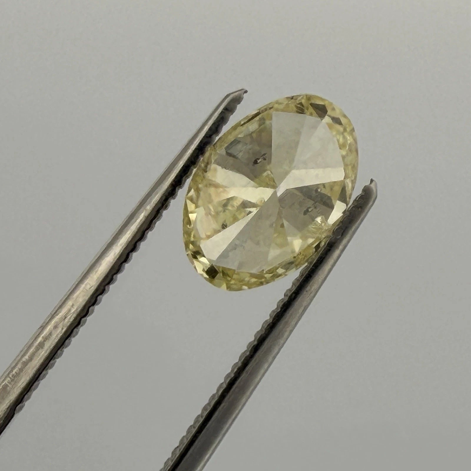 Natural Fancy Yellow Diamond GIA 2.12ct Oval Brilliant I2 Loose Diamond, side detail