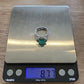 18K White Gold Oval Cabochon Emerald Ring 4.63ct Diamond Split Pave Shank 0.85ct by Devine & Co — stone detail