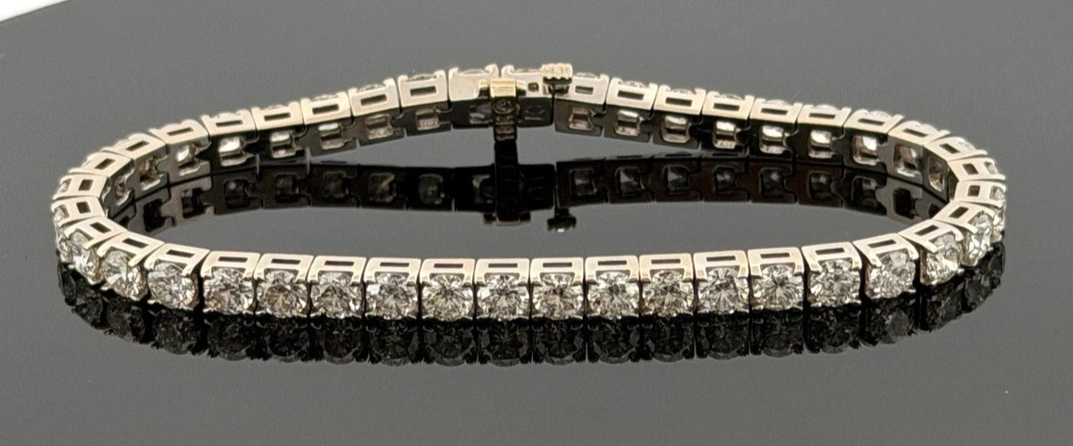 14K White Gold Natural Round Diamond Tennis Bracelet 9.80 ctw 7" G-H VS-SI by Devine & Co — profile view