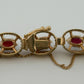 Vintage 14K Yellow Gold Natural Garnet Link Bracelet Bark Finish 12CTW 8 27 Gr by Devine & Co — stone detail