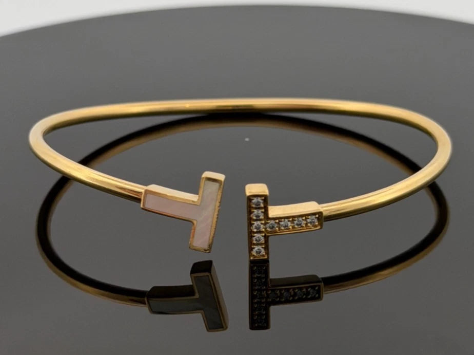 Tiffany & Co. T Wire Bracelet 18K Yellow Gold Mother of Pearl Diamond Bracelet by Devine & Co — stone detail